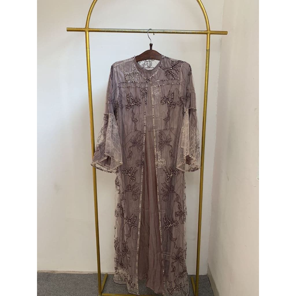 Qoni | Gaun Nirmala | Gaun Elegan | Desain Transparan dan Detail Bunga 8